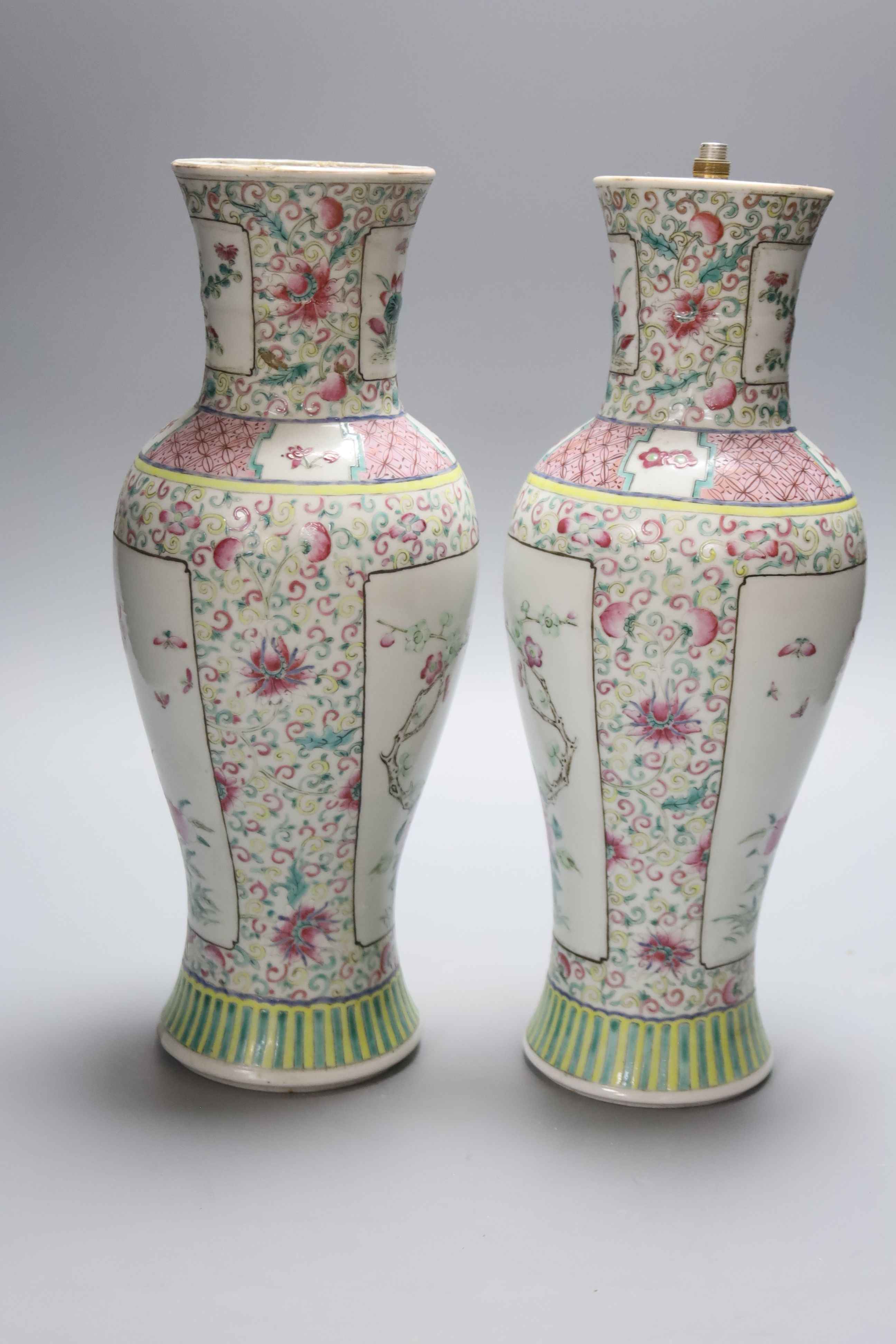 A pair of 19th century Chinese famille rose vases- ex lamp bases, height 31.5cm